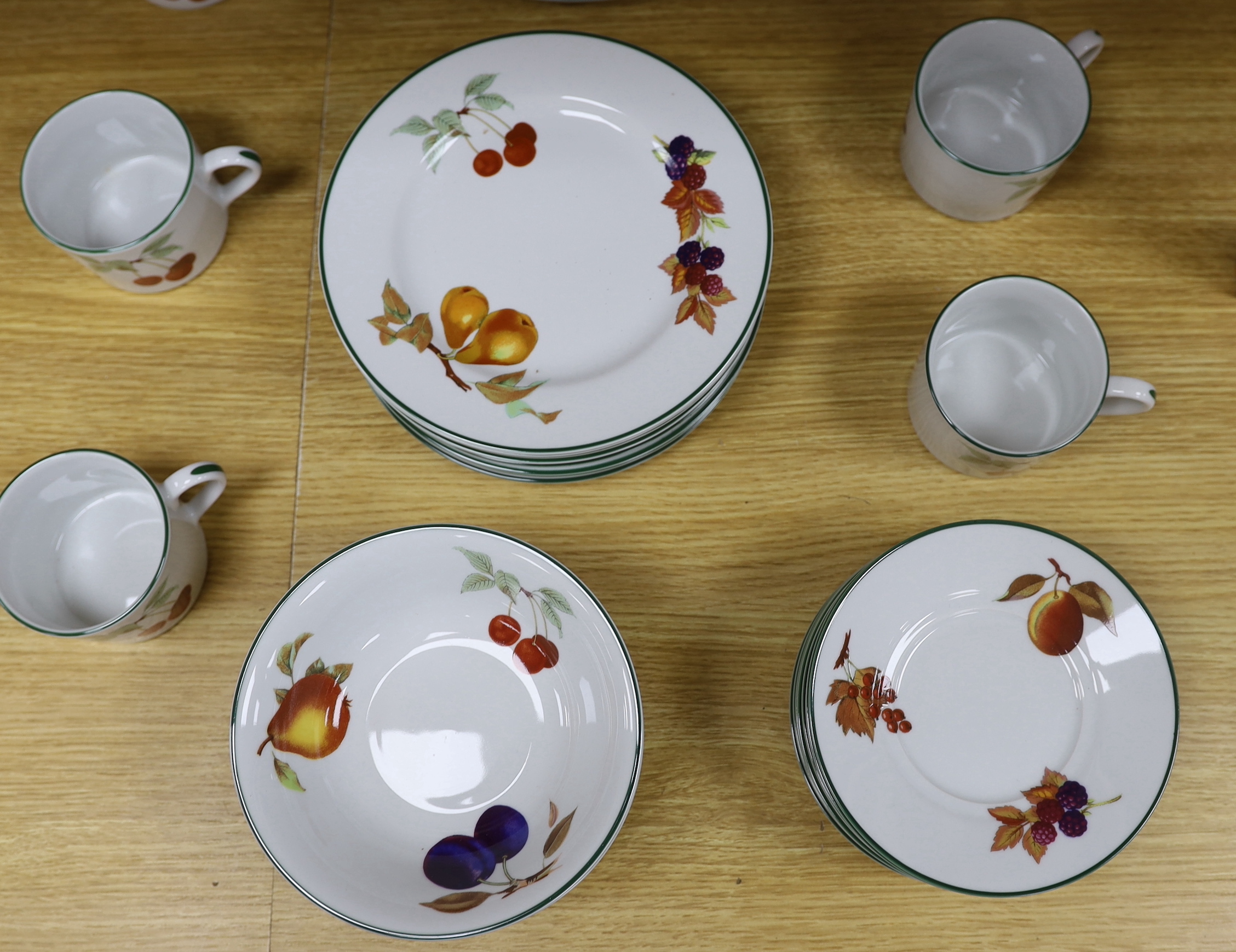 A Royal Worcester “Evesham Vale” eight place setting, dinner and coffee service